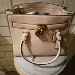 Michael kors purse brand knew